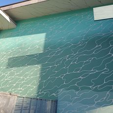 La piscine sous les palmiers