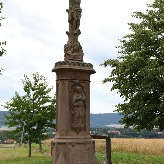 Wayside cross in front of the golf course