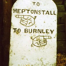 Guide post 5 metres to west of Number 31 Edge Hey Green