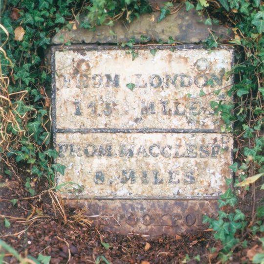 Milestone, 110 metres north of junction with Anglesea Drive