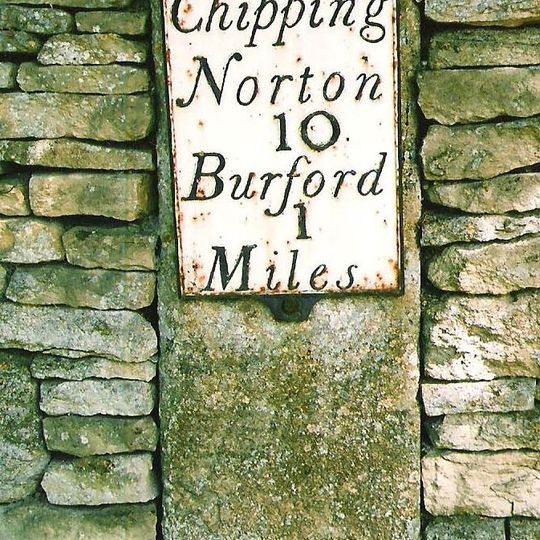 Milestone, Main Road; set in a stone retaining wall on drive of "The House on the Hill"