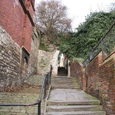 Greestone Steps And Arch With Adjoining Close Wall To West