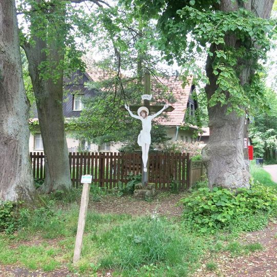 Kříž u domu 9 v Romanově