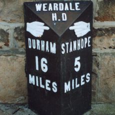 Milestone In Front Of Number 12