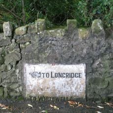 Guidestone, ExYW Lees, E of River Hodder, in wall