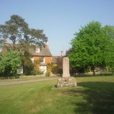 Standing cross on The Green, 130m north west of The Bede House