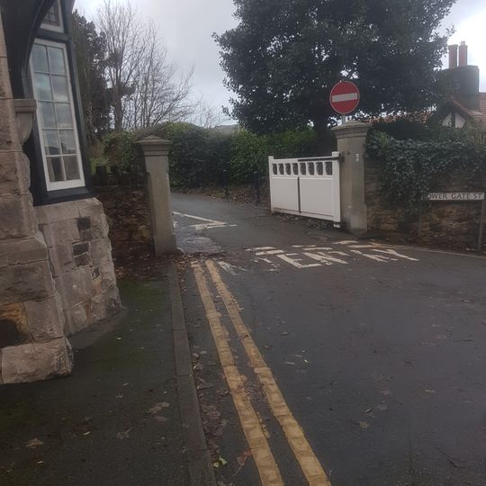 Gate piers, gates and walls at entrance to Bodlondeb from Town Ditch Road