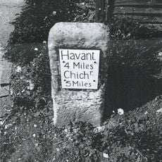 Milestone, Chichester Road; Nutbourne, opp. service station