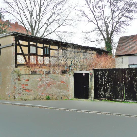 Wohnstallhaus, Scheune und Seitengebäude eines Bauernhofes Melzerstraße 10