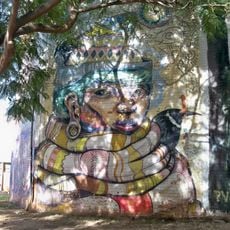 Mural que representa un mexicano con vestimenta típica.