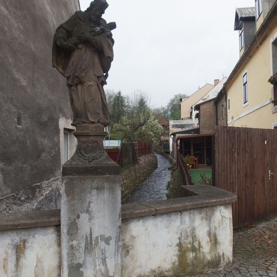 Statue of Saint John of Nepomuk on the bridge over the Široký potok in Klášterec nad Ohří