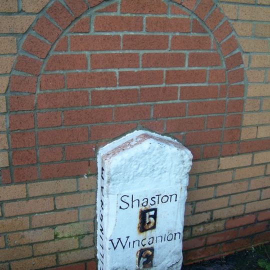Milestone, by new road called Milestone way