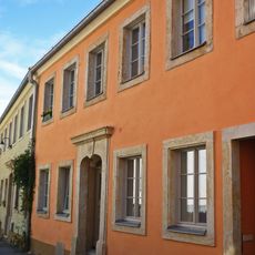 Fassade der westlichen Traufseite als Rest eines ebenerdigen Wohnhauses in geschlossener Bebauung Schloßstraße 13