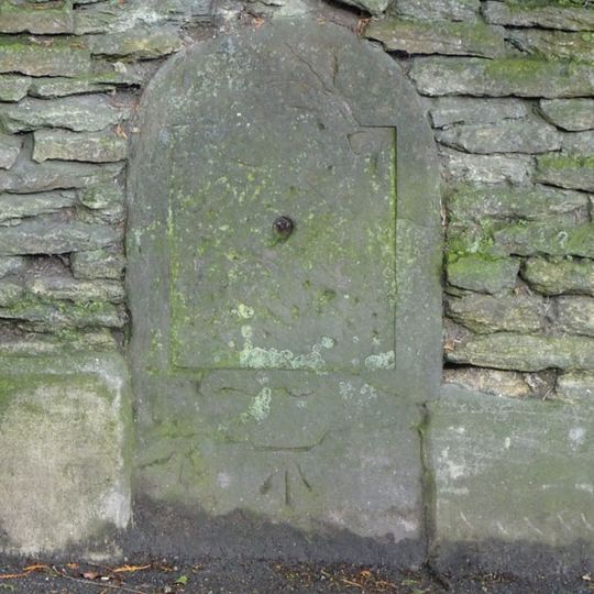 Milestone, W side of The Chipping.