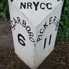 Milestone, 50m E of X rds sign