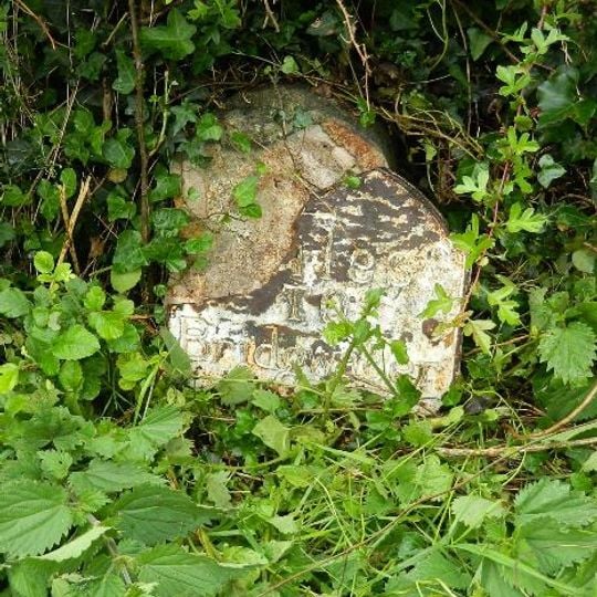 Milestone, New Road, jct with Sandford Hill, W of Wembdon on N slip road of jct with B3339