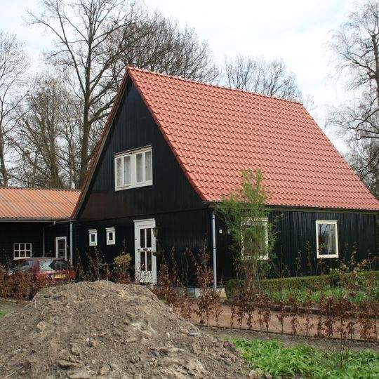 Houten woonhuis van het type OW