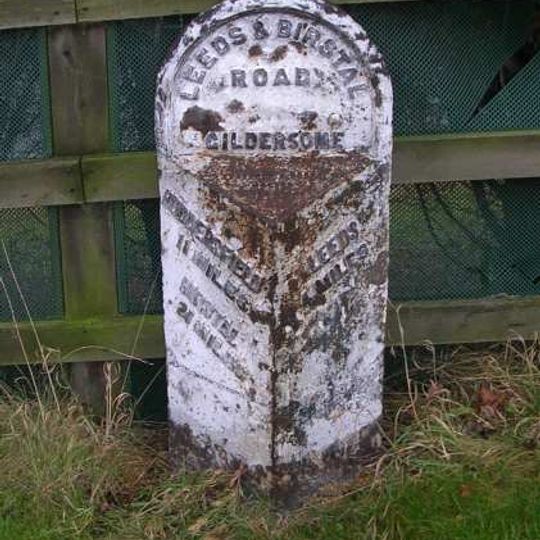 Milestone Approximately 300 Metres North Of Entrance To Woodlands