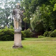 Socha boha Januse v parku zámku Konopiště