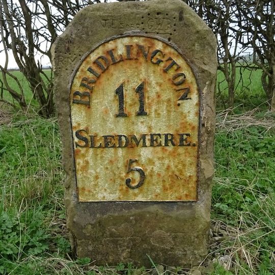 Milestone,  1 mile W of  X rds B1249