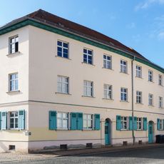 Mietshauszeile (mit sechs Hausnummern) in geschlossener Bebauung konzipiert Marktstraße 6; 8; 10; 12; 14; 16