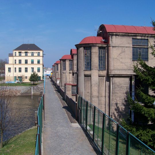 Weir with footbridge in Nymburk