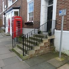K6 telephone kiosk outside Post Office