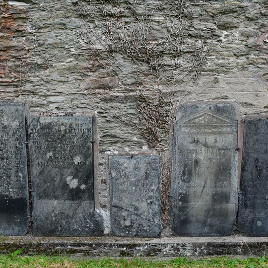 Group Of 4 Monuments In The Churchyard Against The East Wall Of The Chancel Of Church Of St Bartholomew