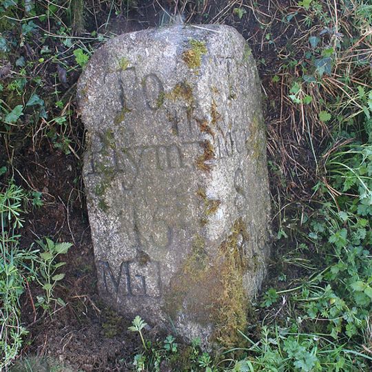 Milestone, 90m W of Hookmoor Cross, in narrow lane
