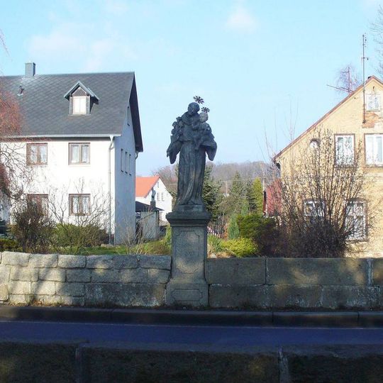 Socha svatého Antonína Paduánského na mostě přes Stříbrný potok v Šluknově