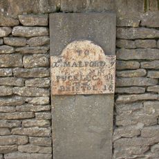 Milestone In Wall About 8 Metres East Of Entrance To Masons