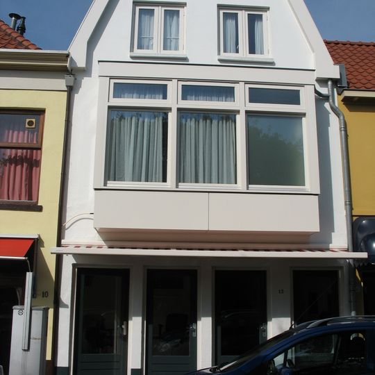 Pand, waarin wellicht een deel van de laat-middeleeuwse stadsmuur is bewaard gebleven