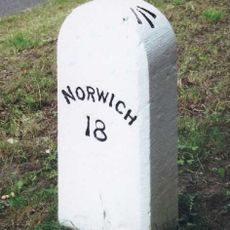 Milestone, 20yds W of jct with B1077