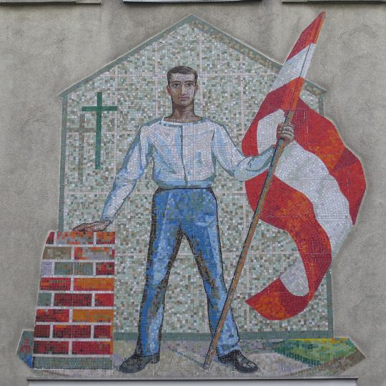 Arbeiter mit rotweißroter Fahne