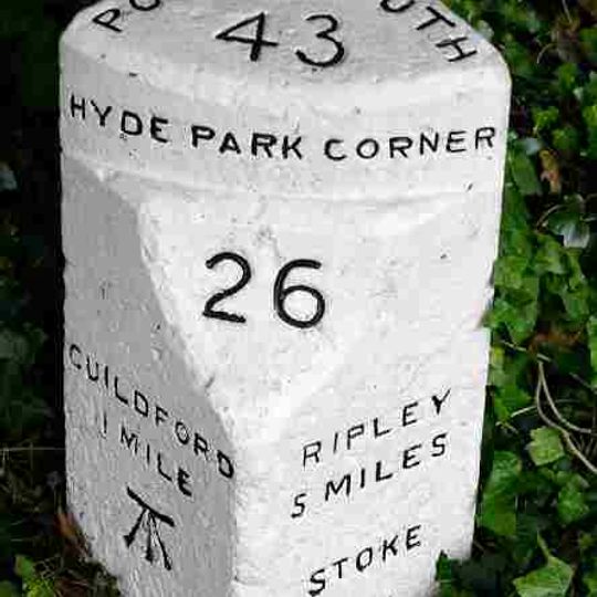 Milestone, London Road, Stoke, at traffic island jct  with A25