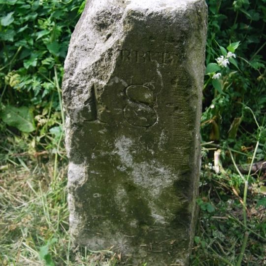 Milestone, E of vilage nr double bend