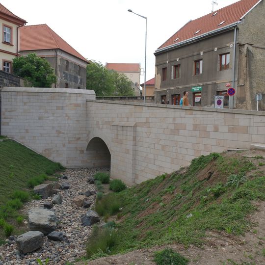 Bridge of Vinařického street over the moat in Slaný
