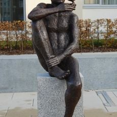 Sitting male with dove