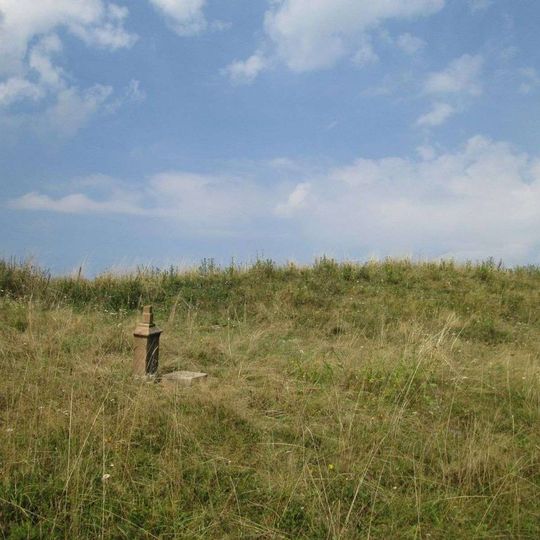 Kříž v poli východně od Damnova