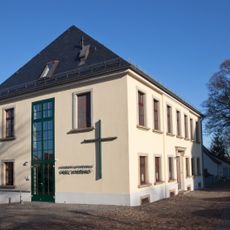 Wohnhaus in offener Bebauung, heute Kath. Gemeindehaus Am Schloß 1