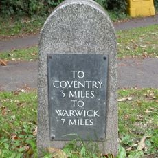 Milestone, Gibbert Hill Road, at jct with Kenilworth Road;