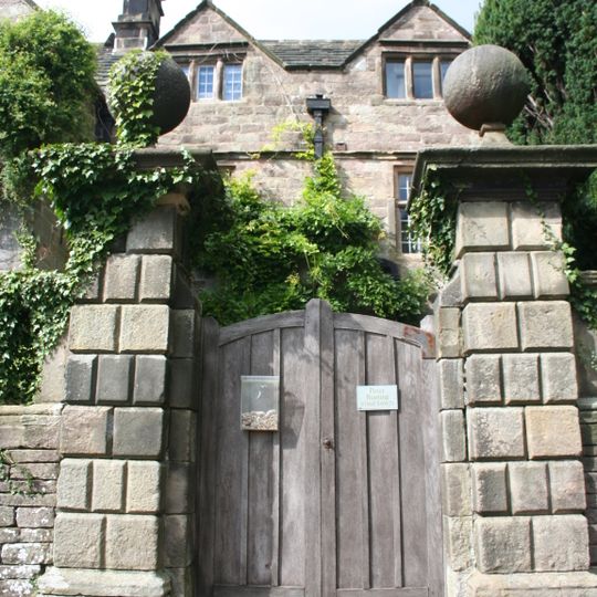 Front garden wall and gate piers of Riber Hall