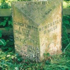 Milepost, entrance to Longstyle Farm
