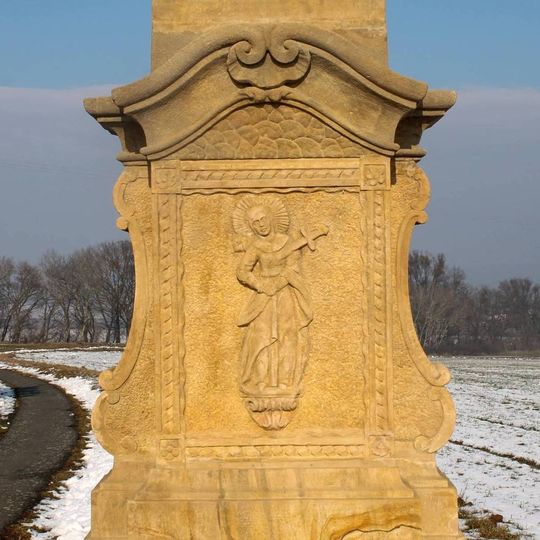 Kříž v Řimicích jižně od vesnice