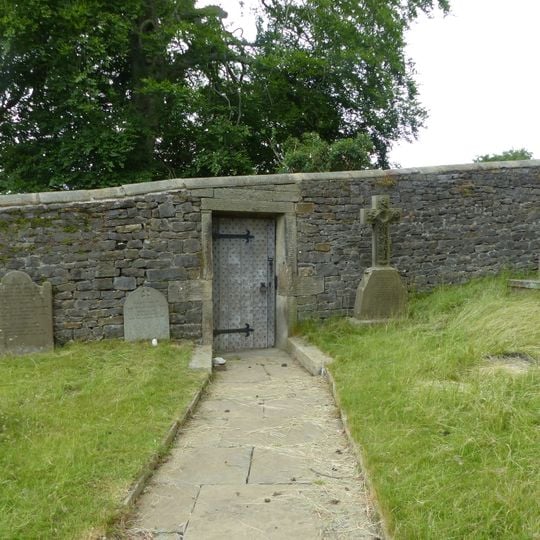 Door and surround in garden wall, Downham Hall, approximately 10 metres south west of church tower