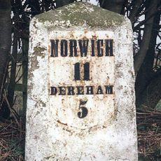 Milestone, E side of entrance to Poppy's Wood car park