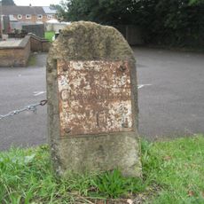 Milestone, Malmesbury Road; 30m S jcn Hill Corner Road outside King Alfred pub