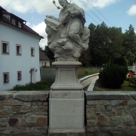 Statue of John of Nepomuk on the bridge in Kunžak