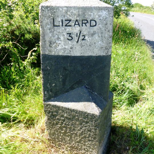 Milestone, Penhale, just S of bend and T jct