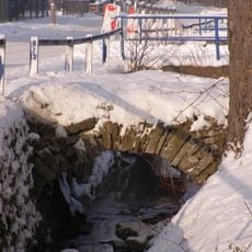 Stone arch bridge over the Metylovka in Metylovice